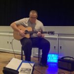 Musics Effects on Parkinson's - a photo of my playing guitar