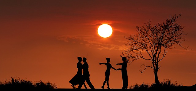 Benefits of Exercise on Parkinson's Disease - photoof couple dancing at sunset