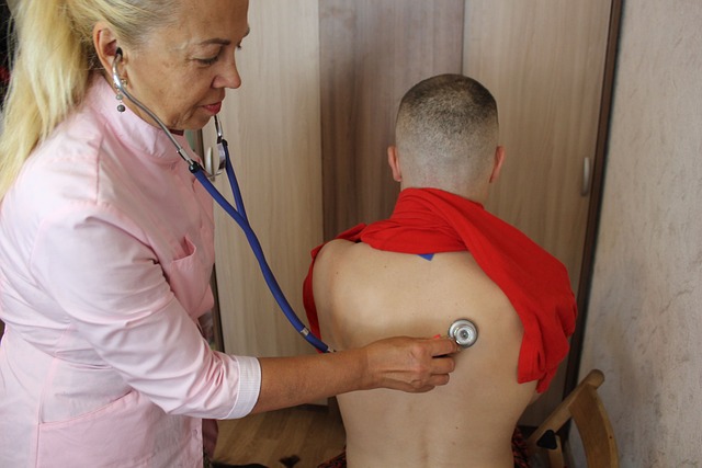 Movement Disorder Specialist - Photo of a physician examining a patient