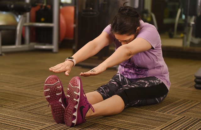 Flexibility with Parkinson's - photo of a woman doing a static hamstring stretch