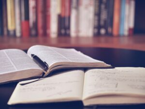 Parkinson's Disease - Photo of a book and a personal journal for note taking.